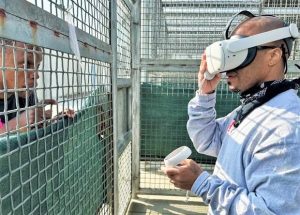 Corcoran prison virtual reality program with one using a headset.