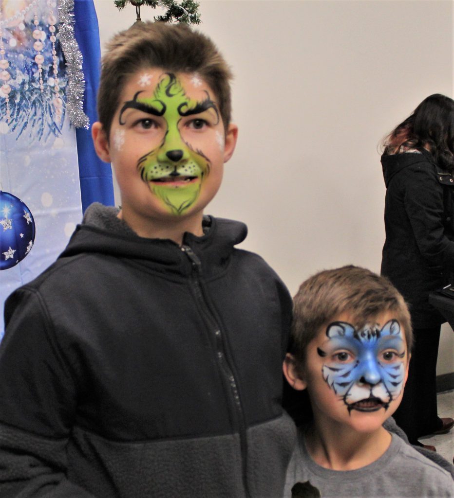 Kids with painted faces.