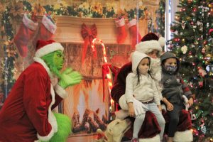The Grinch, Santa and children at Coalinga City Hall.