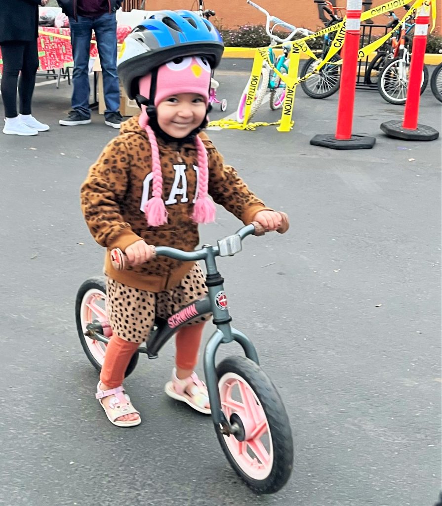 Girl on prison-refurbished bike.