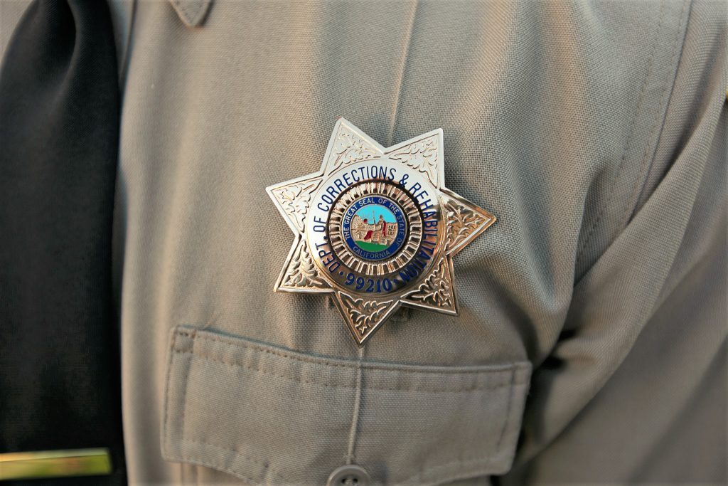 CDCR correctional officer badge.