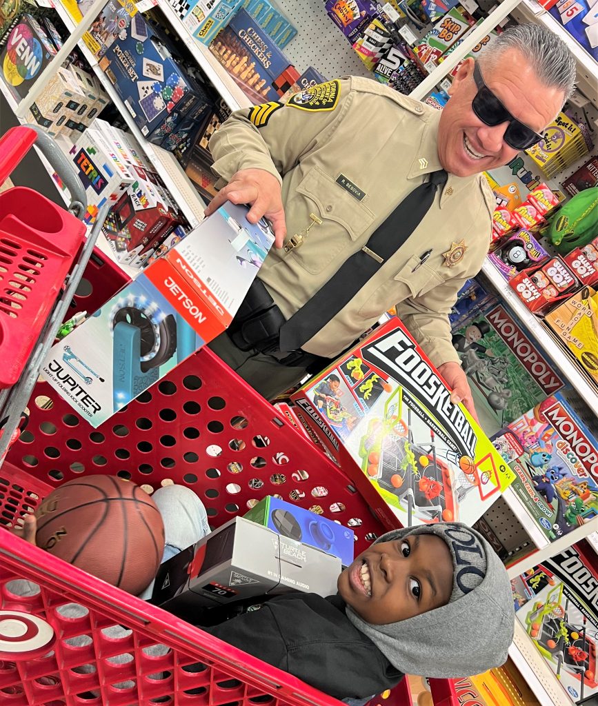 A correctional sergeant and a child shopping at Target.