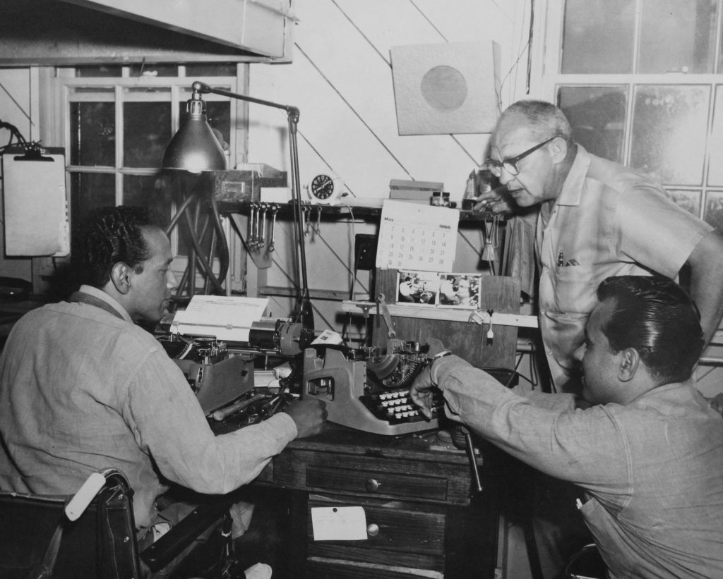 CMC staff teaches incarcerated men learn how to repair typewriters in 1966.