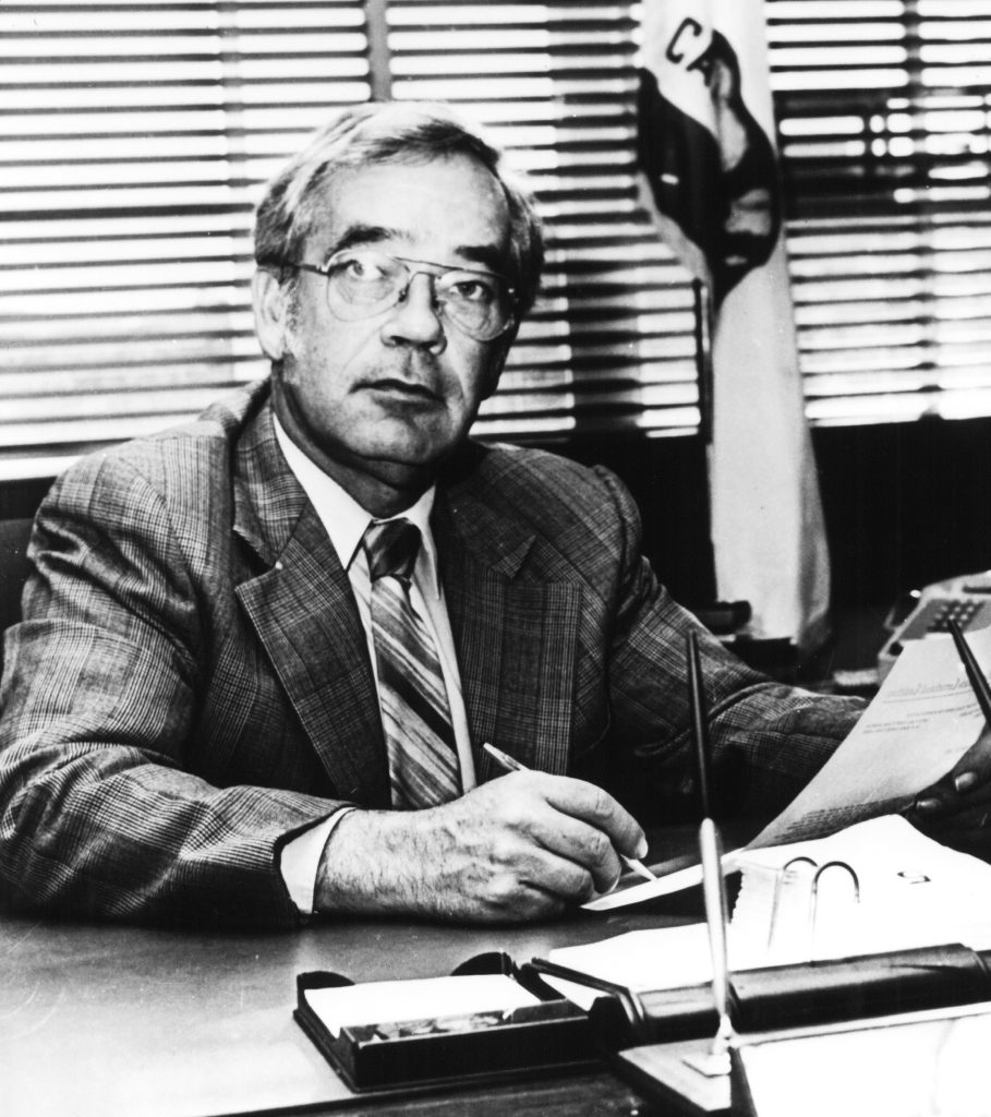 Wayne Estelle as leader of California Men's Colony.