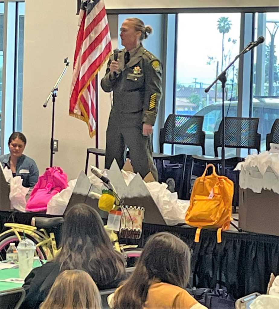 California Institution for Women warden speaking to a group.