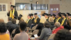 OMCP graduate gives speech at graduation.