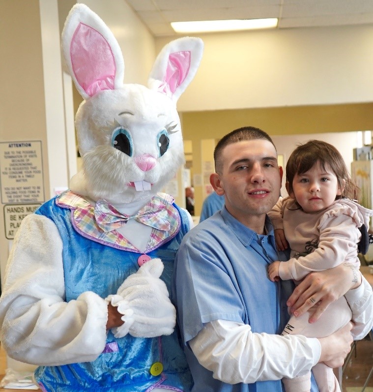 Easter bunny with a family at San Quentin.