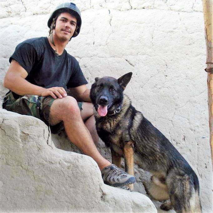 Marine Joshua Ashley and his K-9 Sirius in Afghanistan.