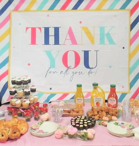 A Thank You banner with snacks and beverages purchased by staff for Mother's Day visiting.