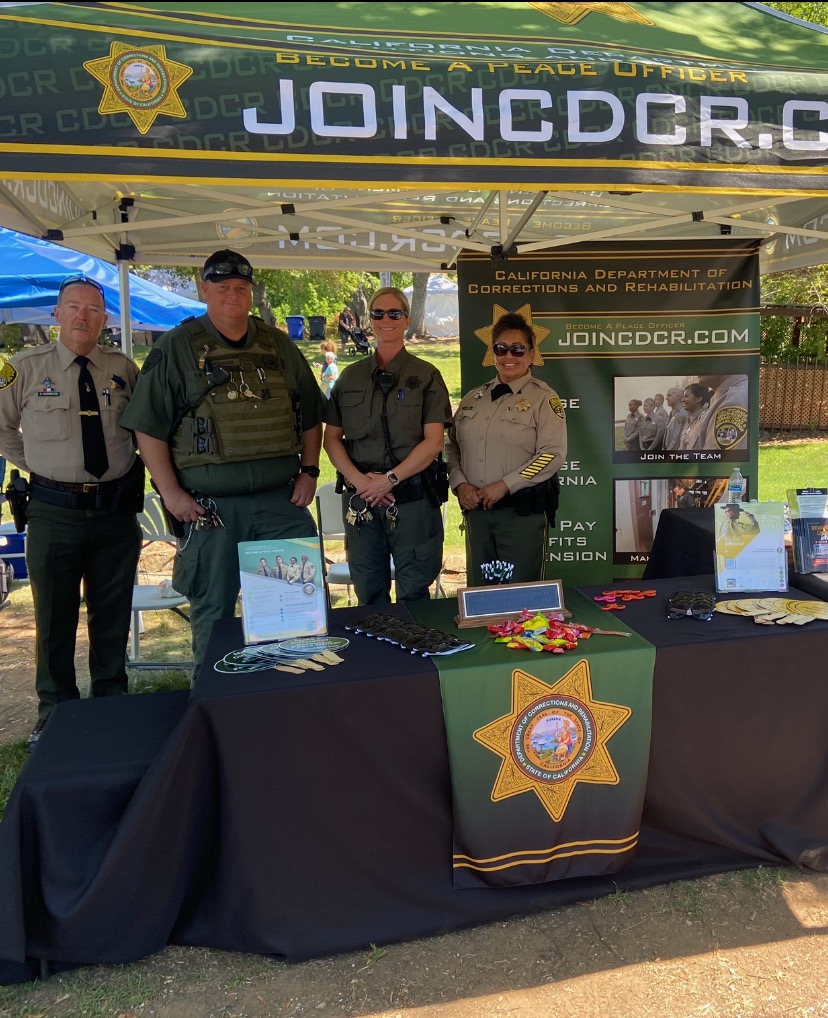 Sierra Conservation Center staff at a recruitment booth at the county fair.