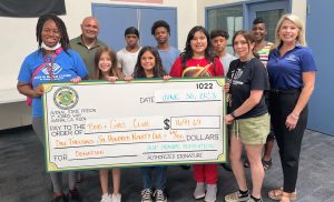 A check made out to the Boys and Girls Club for nearly $1,700 signed by the inmate population of Avenal State Prison (ASP).