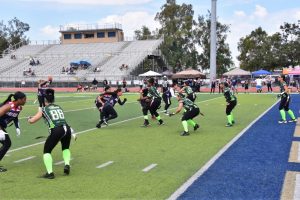 Female football players on the field.