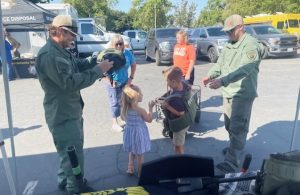 The Safety Day event with MCSP recruiters engaging with children and families.