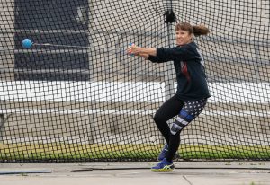 Female correctional officer competes in the hammer throw in San Diego.