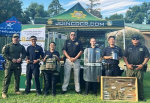 CCWF recruiters with kids at a Merced National Night Out event at Applegate Park.
