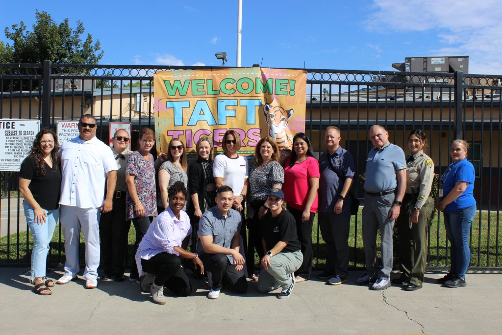 CDCR staff and volunteers at a school in Taft.