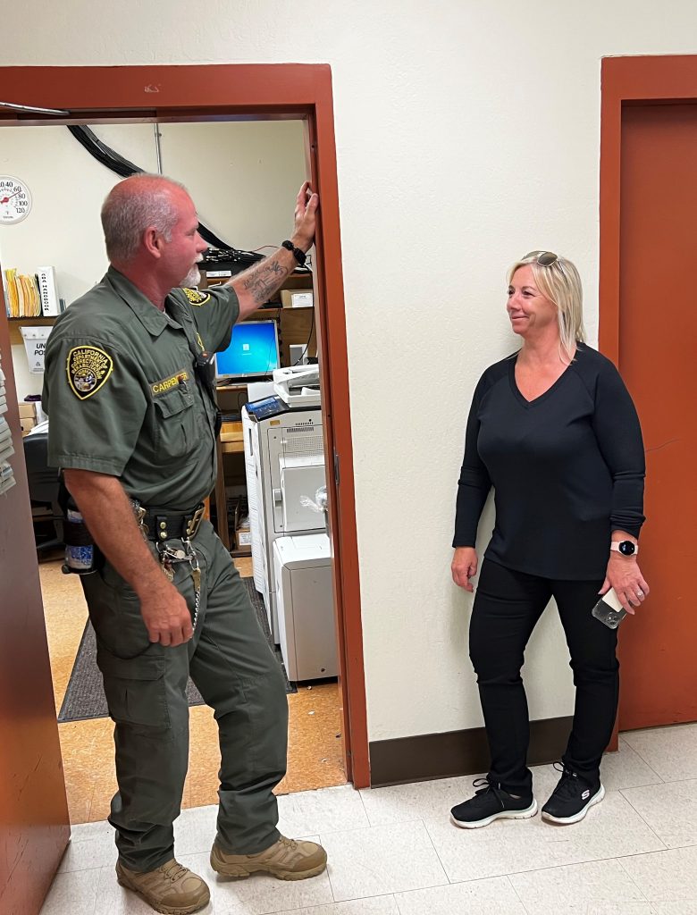 Foss speaks with PBSP correctional officer