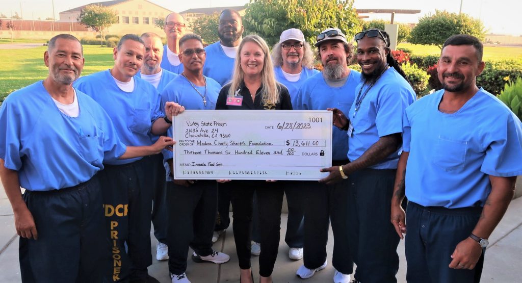 Valley state prison incarcerated donate to MCSO with check