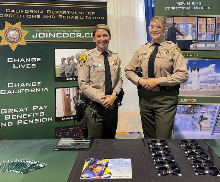 Two CDCR staff recruiters at the California State Fair.