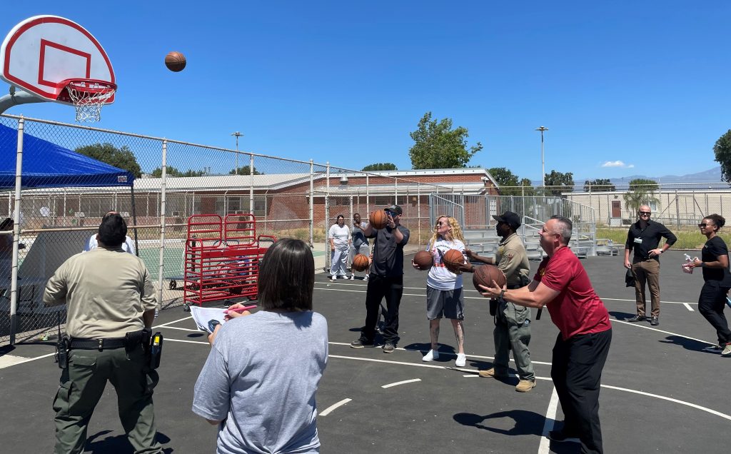 CIW staff playing basketball in observance of the fallen