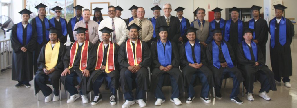 group photo of NKSP graduates and staff at ceremony