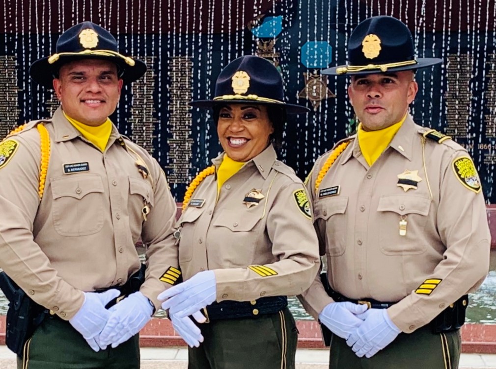 CDCR honor guard with three people in dress uniforms.