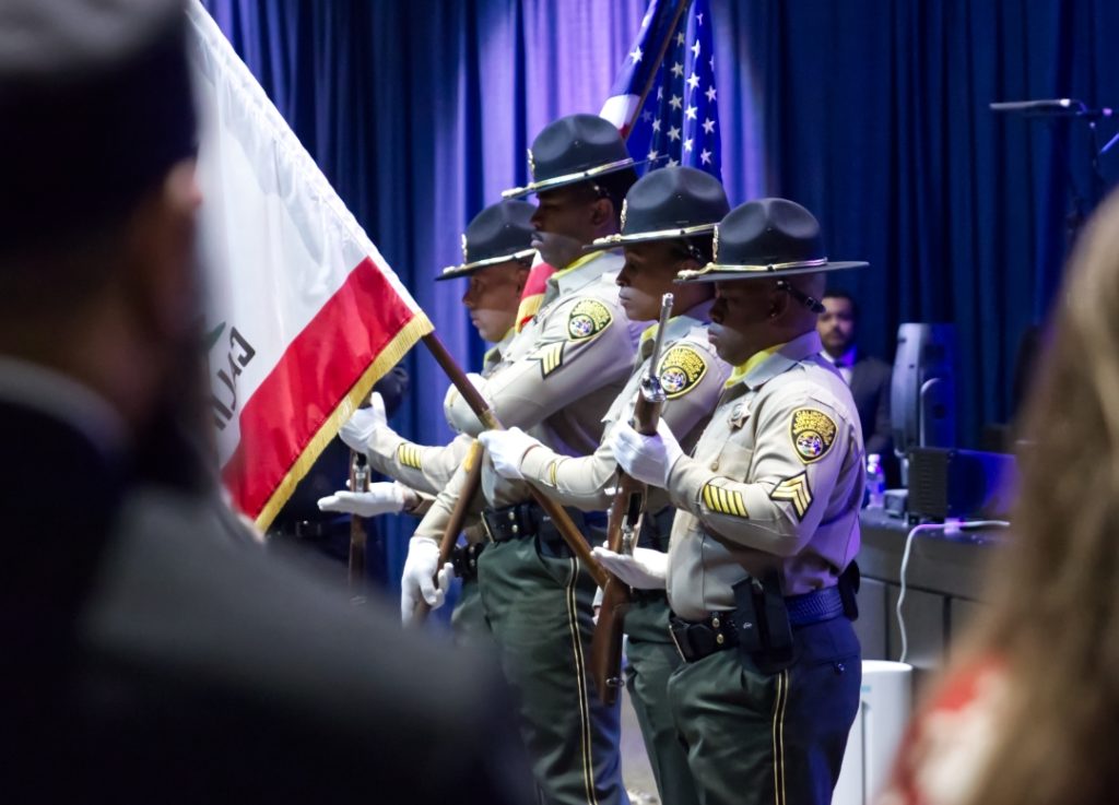 Medal of Valor closer look at the honor guard holding flags.