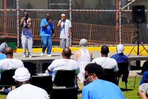 incarcerated performing on stage in front of audience at San Quentin Summer Blast