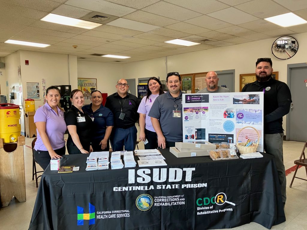 Overdose Awareness Day 2023 with ISUDT booth inside a prison.