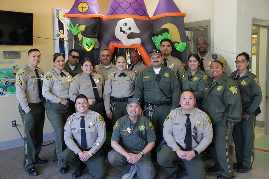 CHCF staff posing for group photo CDCR Halloween