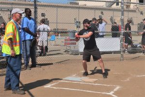 SCC softball game for Special Olympics with incarcerated people and volunteers.