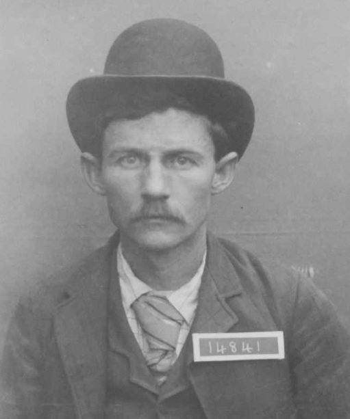 Henry Haas, 14841, was one of the first to receive parole in California in December 1893. He's wearing a hat and tie in his prison intake photo taken in 1892.