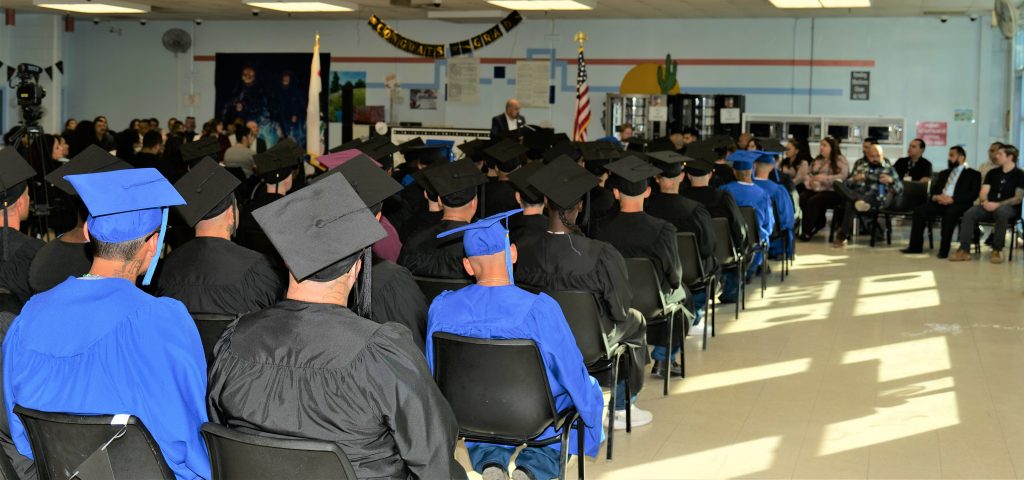 Calipatria education graduation members sitting