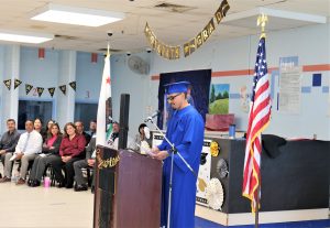 incarcerated gives speech at Calipatria State Prison education graduation.