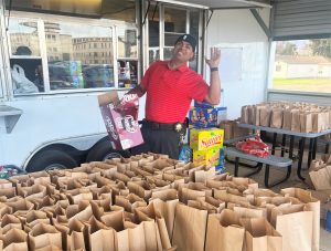 Staff appreciation event at CTF with bags of food and sodas.