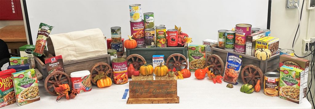 LAC Thanksgiving gift basket crafted to look like an Old West wagon train.