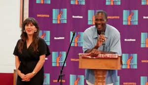 incarcerated next to staff at Uncuffed graduation