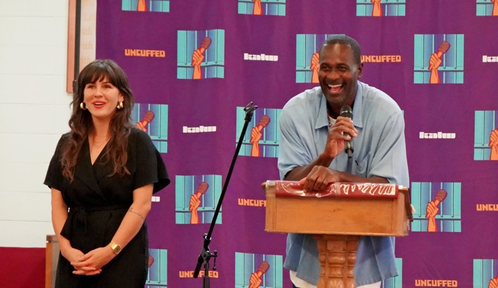 incarcerated next to staff at Uncuffed graduation