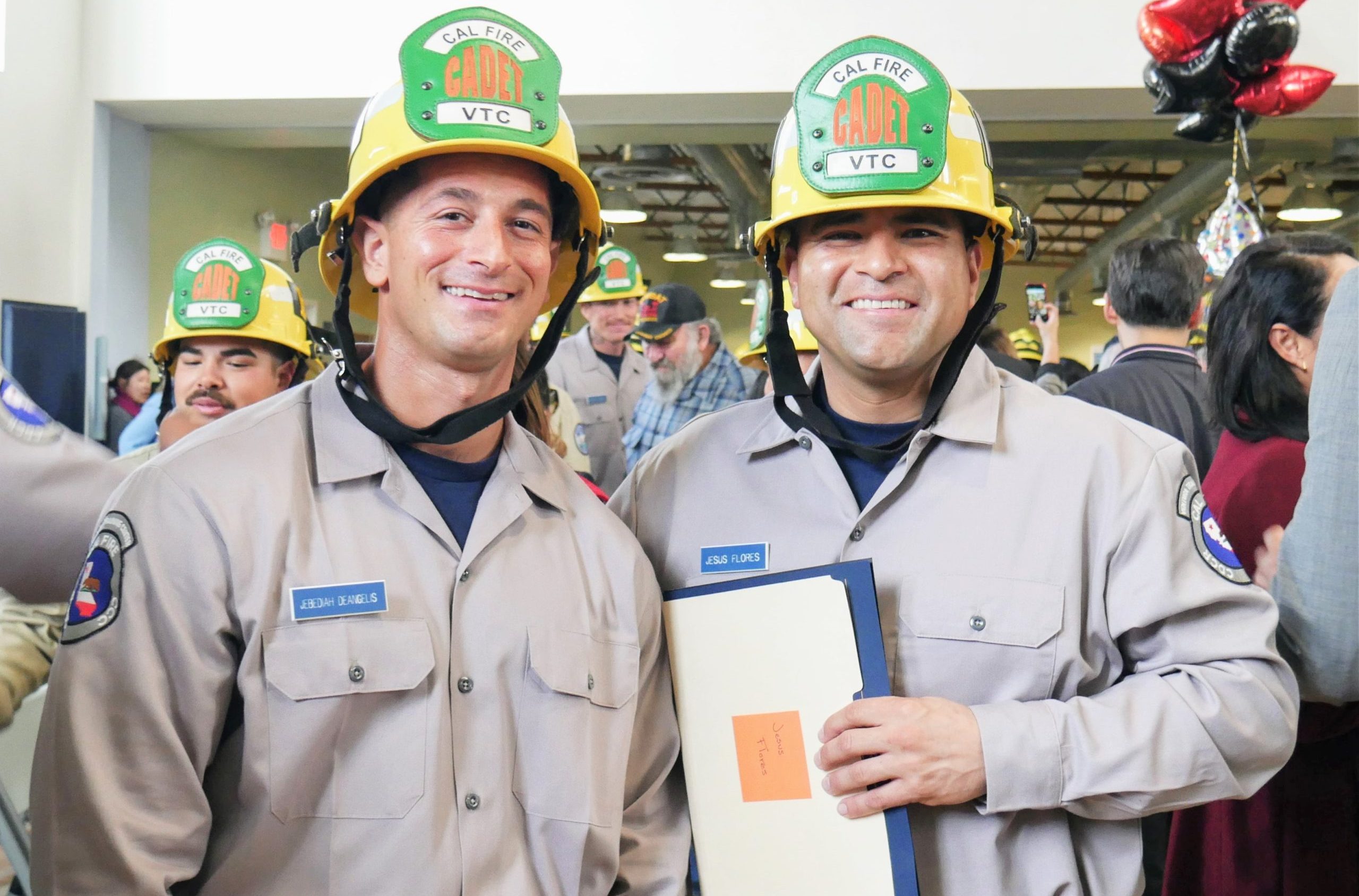 Ventura Training Center firefighter program graduates smiling while holding certificates.