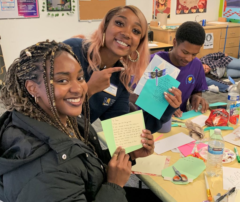 Students create cards to be delivered to the incarcerated people at Central California Women's Facility.