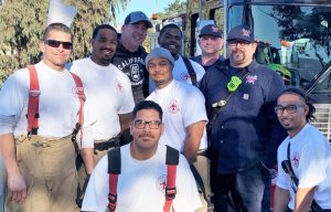 Correctional Training Facility incarcerated firefighters and staff gather to support the high school football team.