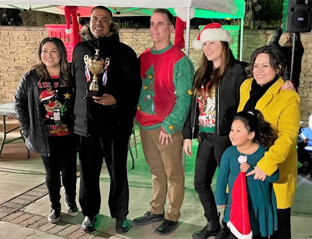 CTF staff wearing holiday sweaters.