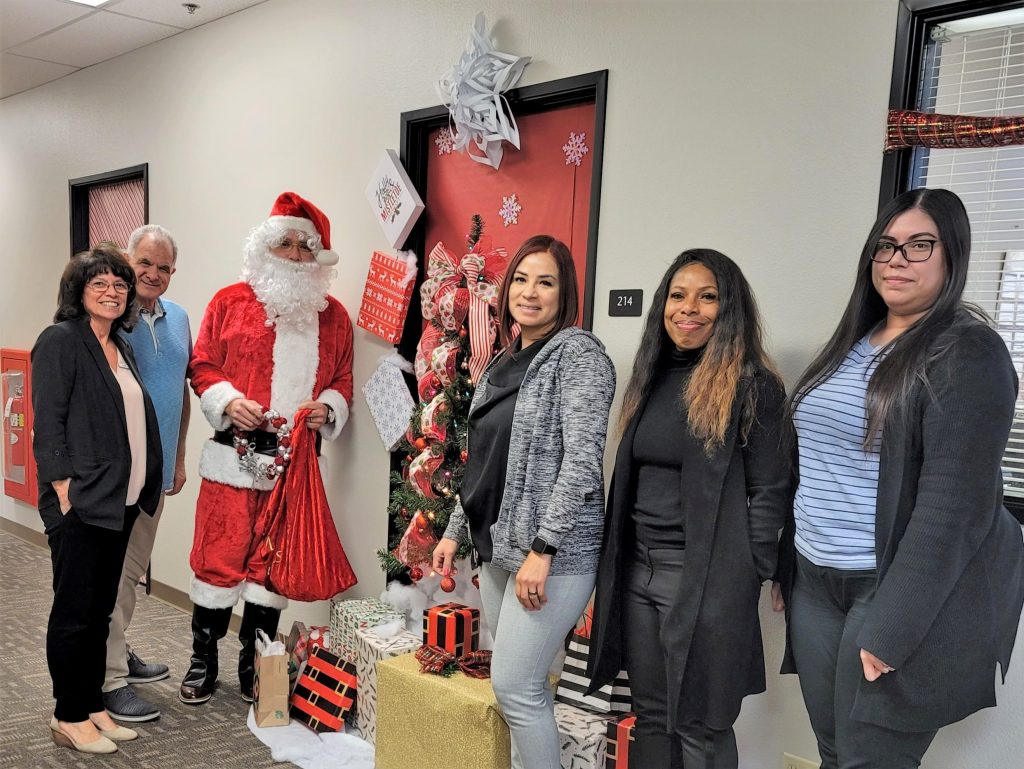 Parole staff and a decorated door with Santa.
