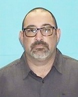 George Dagnino wearing glasses.