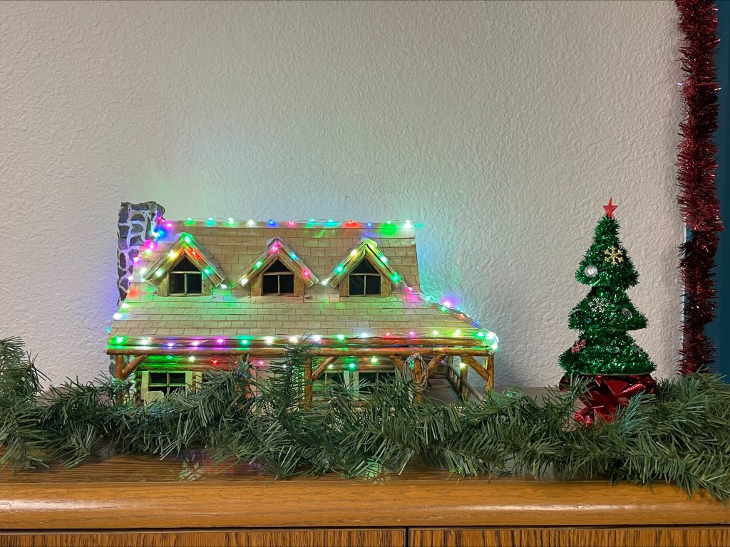 A small lighted house for the holidays.
