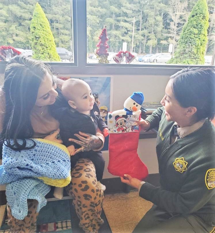 Smiles and gifts for the children.