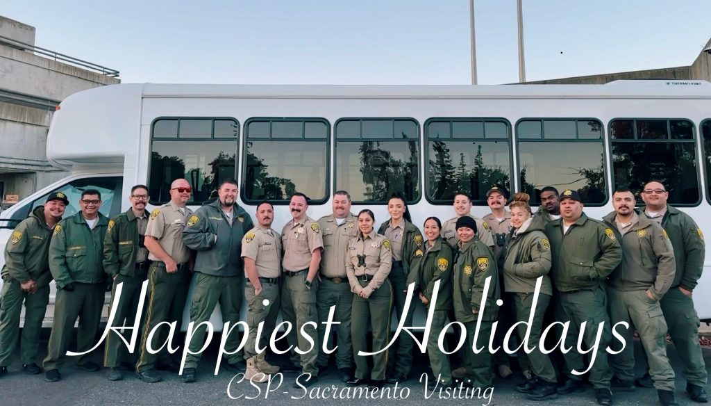 A card showing California State Prison Sacramento visiting staff wearing uniforms and a bus behind them, with the words "happiest holidays, CSP-Sacramento Visiting" in a greeting card style.