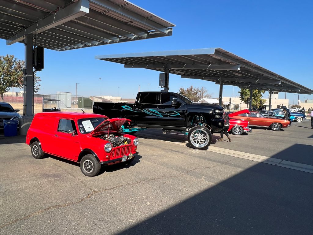 A red car and a black truck