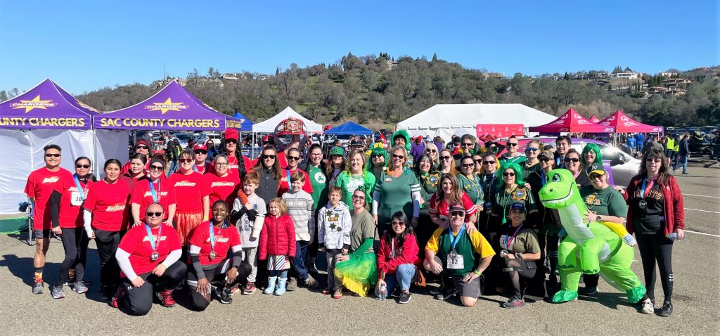A group of people wearing different costumes.