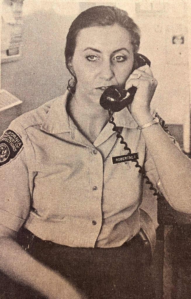 First female correctional officer at Deuel Vocational Institution in Tracy, 1973. She's shown here speaking on the phone.